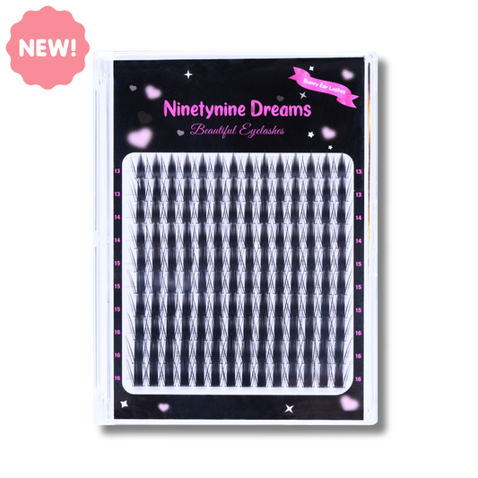 Ninetynine Dreams Bunny Ear Lashes – NEW 140PCs dramatic spiky lash clusters, 13–16mm with C++ curl. Lightweight reusable synthetic fiber eyelashes with bold bunny-ear-inspired style, thin black band for comfort, perfect for anime, glam, and night-out looks.