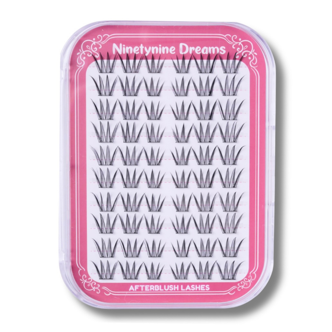Close-up of the [NO GLUE] Afterblush self-adhesive cluster lash tray with pre-mapped lash clusters.